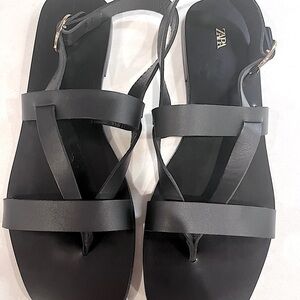 Black flat sandals